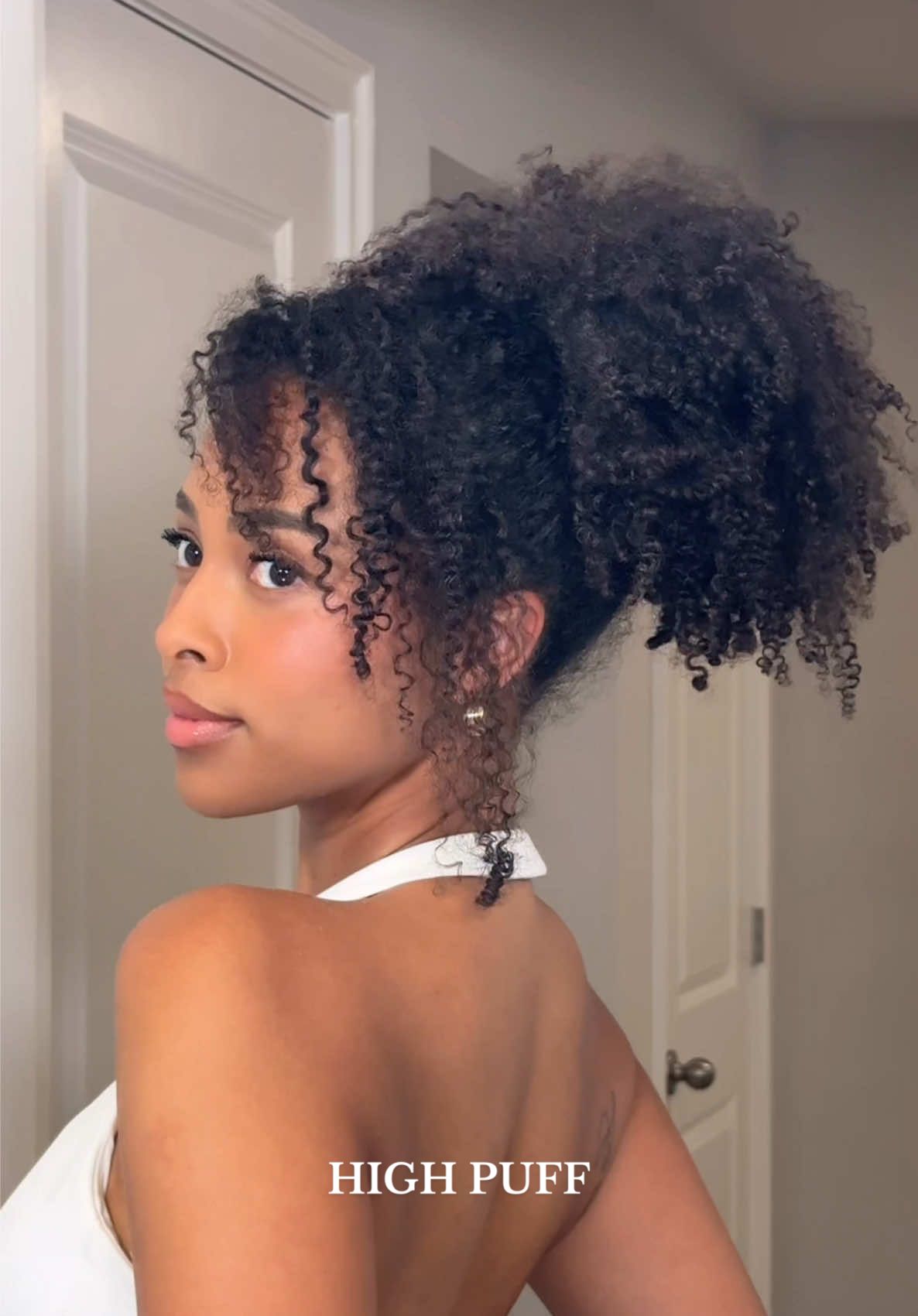 What do we think of this high puff with the side bang for a Valentine's Day look?! ❤️ #type4hair #curlyhairstyles #valentinesdayhair #lipcombo #coilyhair #4ahair 