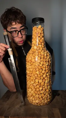 A huge jar of popcorn, sharpness test! #fyp #knife #satisfying #knifesharpening #knifesharpener #popcorn #kitchenknives 