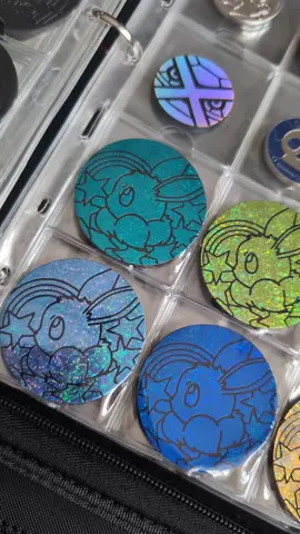 I cannot deal with the cuteness of these new coins 😍😍  THERES A VIDEO ON MY PROFILE SHOWING WHERE I GOT THE BINDER FROM! #pokemontcg #pokemoncommunity #pokemoncards #pokemontiktok #pokemon #prismaticeeveeultion #prismatic #eevee 