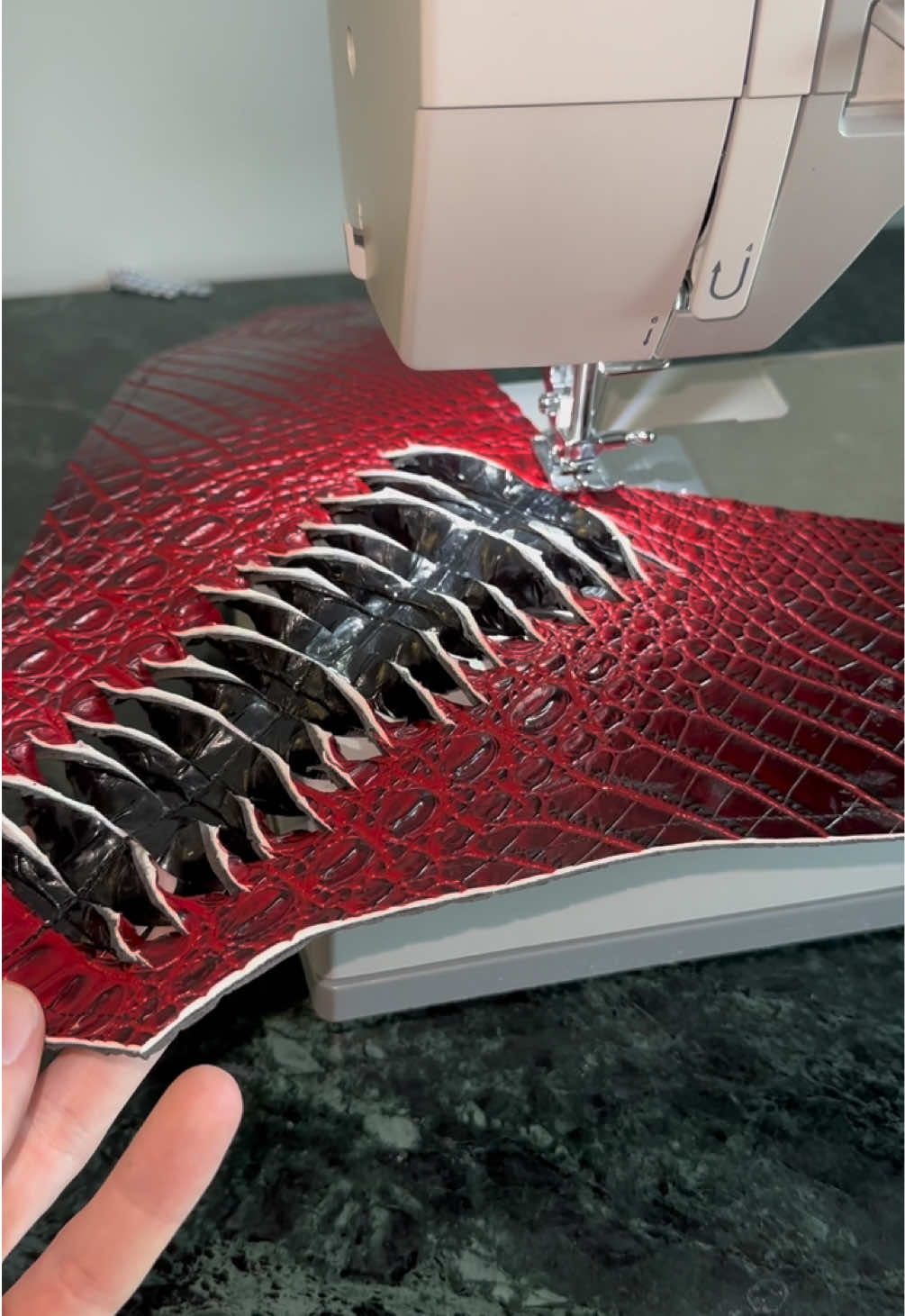 Our inverted slash technique being put into further action on a double sided dead stock embossed leather for my upcoming Titan Collection! #ecofashion #sewingtiktok #fashiontiktok 