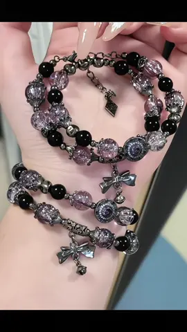 Gothic Elegance: Black & Purple Glass Beaded Bracelet 🖤💜 Embrace a dark and elegant aesthetic with this handmade bracelet. Crafted with deep black and purple glass beads, accented by black metal and zircon charms, this piece brings a bold and gothic-inspired touch to your look. Perfect for lovers of mysterious beauty and intricate details! ✨ 🖤 Black metal accents with purple glass beads 💎 Black zircon and bow charms for a gothic vibe 🌟 Ideal for statement or layered styles Add this enchanting bracelet to your collection today! #GothicJewelry #HandmadeBracelet #PurpleBeads #DIYJewelry #DarkElegance #StatementAccessory #diybracelet #HandmadeJewelry #ElegantStyle #JewelryAddict #BeadedBracelet #MinimalistJewelry #CrystalBeads #JewelryDesign #UniqueStyle #FashionAccessories #beads #DIY #fashion #bracelet #Handmade #handmadejewelry #beadedjewelry #beadedbracelets #vintagefashion #vintagejewelry #handmadebracelet #braceletstacks #blingbling 