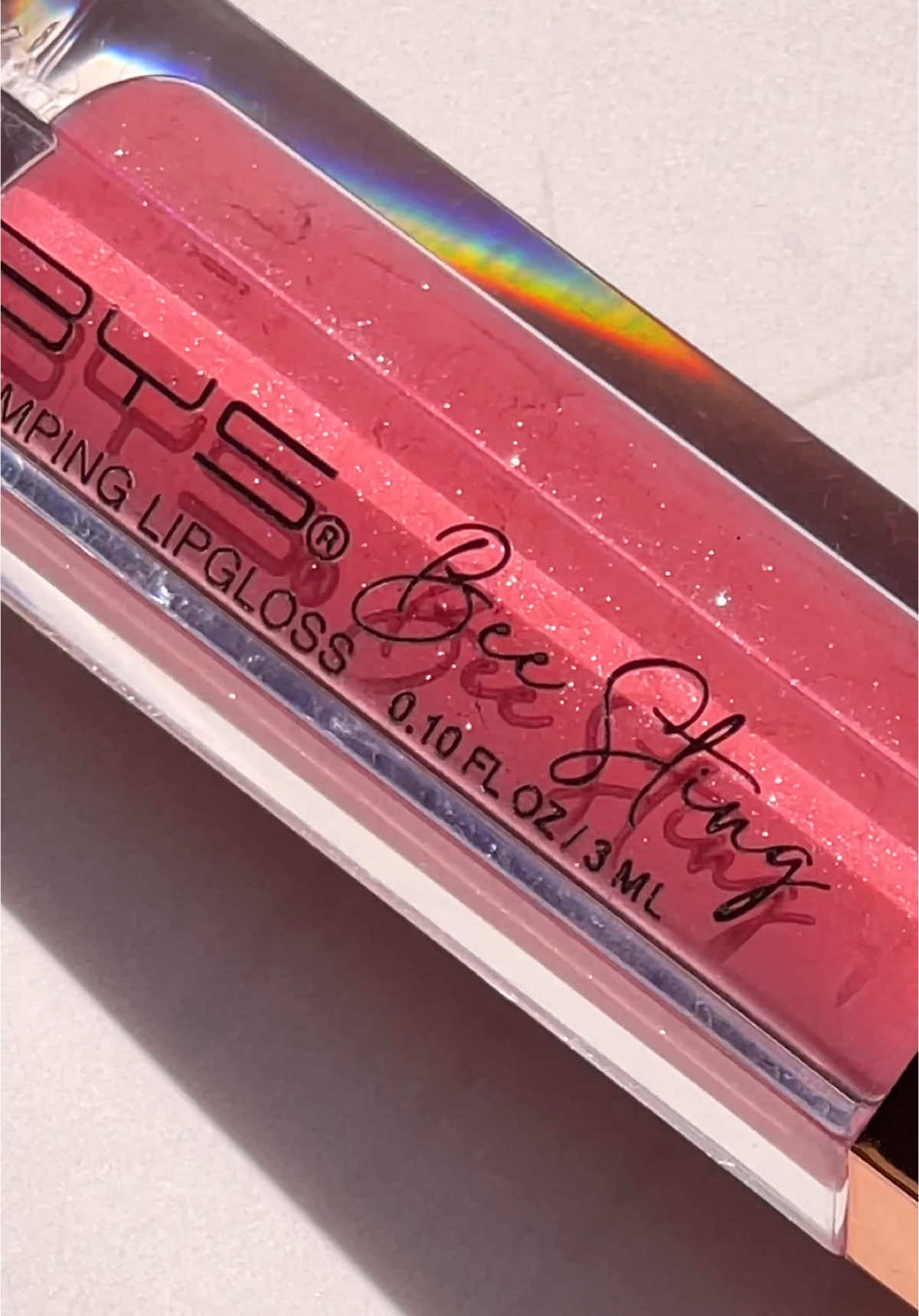 our bee sting plumping lipglosses give you the perfect glittery shine with a wash of colour 💘 #byscosmetics #beauty #drugstoremakeup #lipcombo #plumplips #plumpinglipgloss #lipgloss #glossylips #nudelip 