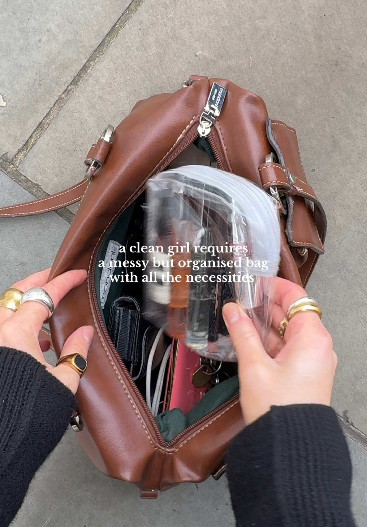 A lip balm? Perfume? Book? Whatever you need I have it 🫡  #girlhood #girlhoodaesthetic #whatsinmybag #whatsinmypurse #londongirl #organisedmess 