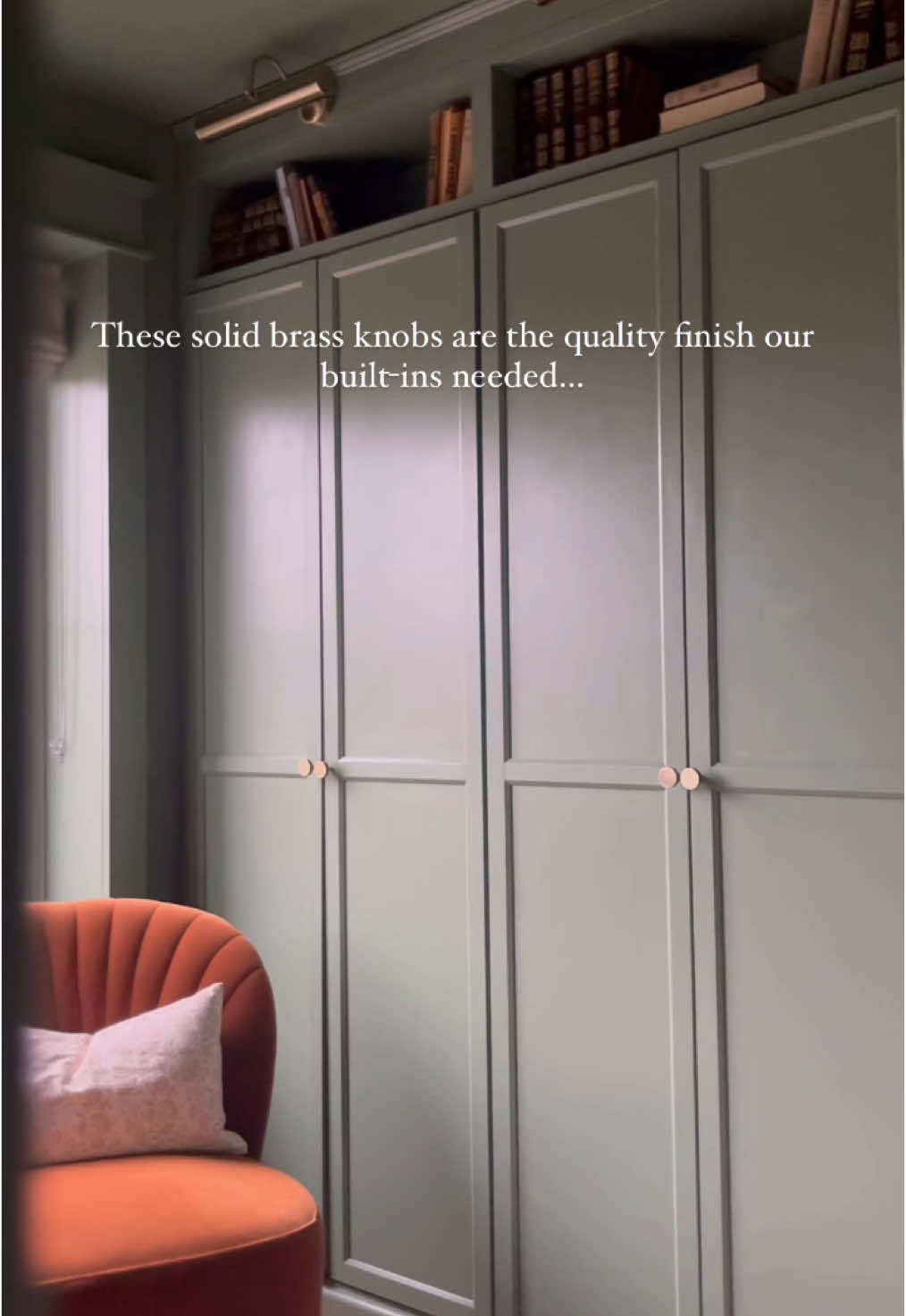 Ad. My favourite room just got some beautiful finishing touches. Green and brass is officially one of my favourite combinations. The antique brass knobs and electrical accessories from @Heritage Brass by M. Marcus pair perfectly with our green drenched study. Once we had painted this room a traditional colour and added the floor to ceiling bookcases, the builder grade plastic outlets and light switches felt out of place. Swapping out the plastic pieces for antique brass is exactly what this dramatic study called for. I love how the brass accents really pull the room together and that they’re all cohesive. These little details are so impactful. They make my new build feel more like our home. Featured in an antique brass finish: 32mm knurled brass knobs  Victorian Range Electrical accessories  #antiquebrass #storagehacks #ikeahack #billybookcase #ikeahackers #storage #upcycled #cabinets #cabinethardware #electricalwork #interiordetails  #moody #darkgreen #homeofficedecor #homelibrary #myhomestyle 