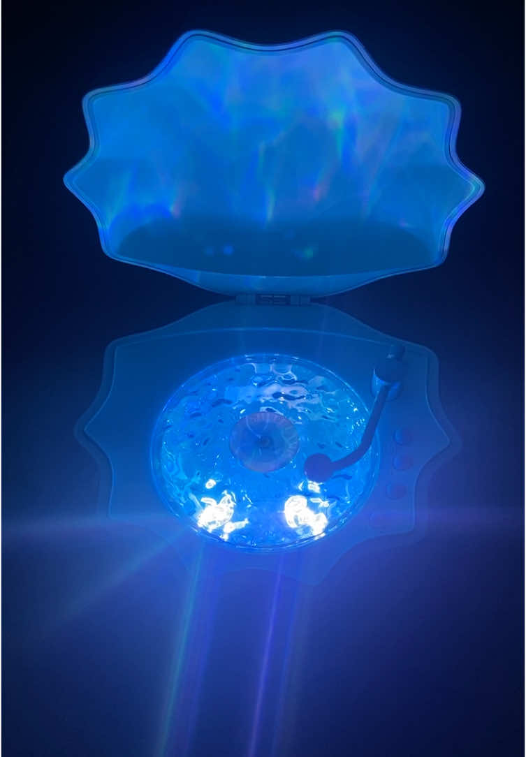 Still obsessed with the new @LumenaLights shell lamp. This is so cute. To turn on and off, you move the needle onto the record. This lamp I mostly use for music or audiobooks, but it also comes with cool ocean sound and lights up plenty of different colors. I’ve been obsessed with this ever since I saw it on @Sia Shells page.   #shelllamp #mermaidvibes #recordplayer 