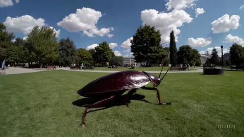 Giant cockroach walking around the park generated by AI