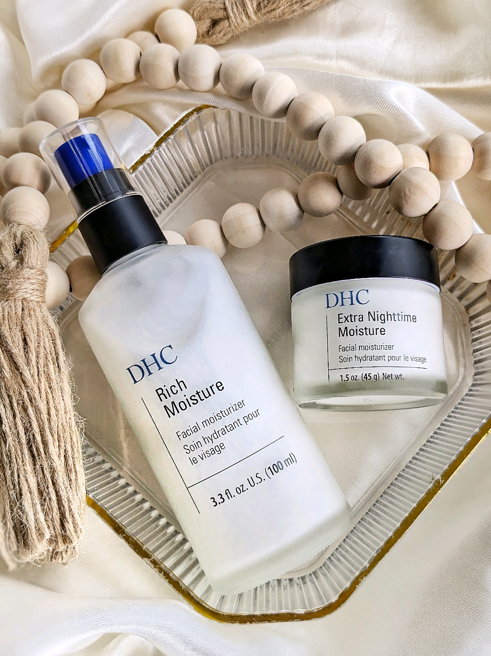 Wooohooo 🩷. I am so happy I got an opportunity to try this skincare duo by @DHC Skincare USA  . These creams are so lovely for dry skin. They are so hydrating and nourished the skin wonderfully. They are great to apply into your AM and PM skincare routine. 🩷Products Featured; 🌞AM: Start Your Day with Fresh, Lightweight Hydration Rich Moisture: A lightweight moisturizer that keeps your skin soft, hydrated, and glowing all day long. Key Benefits: ✅ Hydrates and revives skin for an all-day glow ✅ Fast-absorbing, lightweight texture ✅ Packed with antioxidants to protect your skin ✅ Perfect for all skin types—gentle yet effective 🌙PM: Nighttime Rejuvenation for Radiant Skin Revitalize your skin during the night with this nourishing facial moisturizer and wake up to rejuvenated, smooth and supple-looking skin. This rich, potent formula absorbs instantly to offer deep moisture relief for all skin types, including dry.   Extra Nighttime Moisture: Wake up to skin that feels nourished, plump, and revitalized. This rich, vitamin-packed night cream works while you sleep. Key Benefits: ✅ Deeply hydrates overnight for a smoother, more elastic feel ✅ Boosts skin’s natural repair process ✅ Restores and nourishes with a blend of soothing vitamins ✅ Ideal for maintaining skin’s overnight recovery @dhcskincare #dhcskincare #dhcisjbeauty #gifted_by_DHC