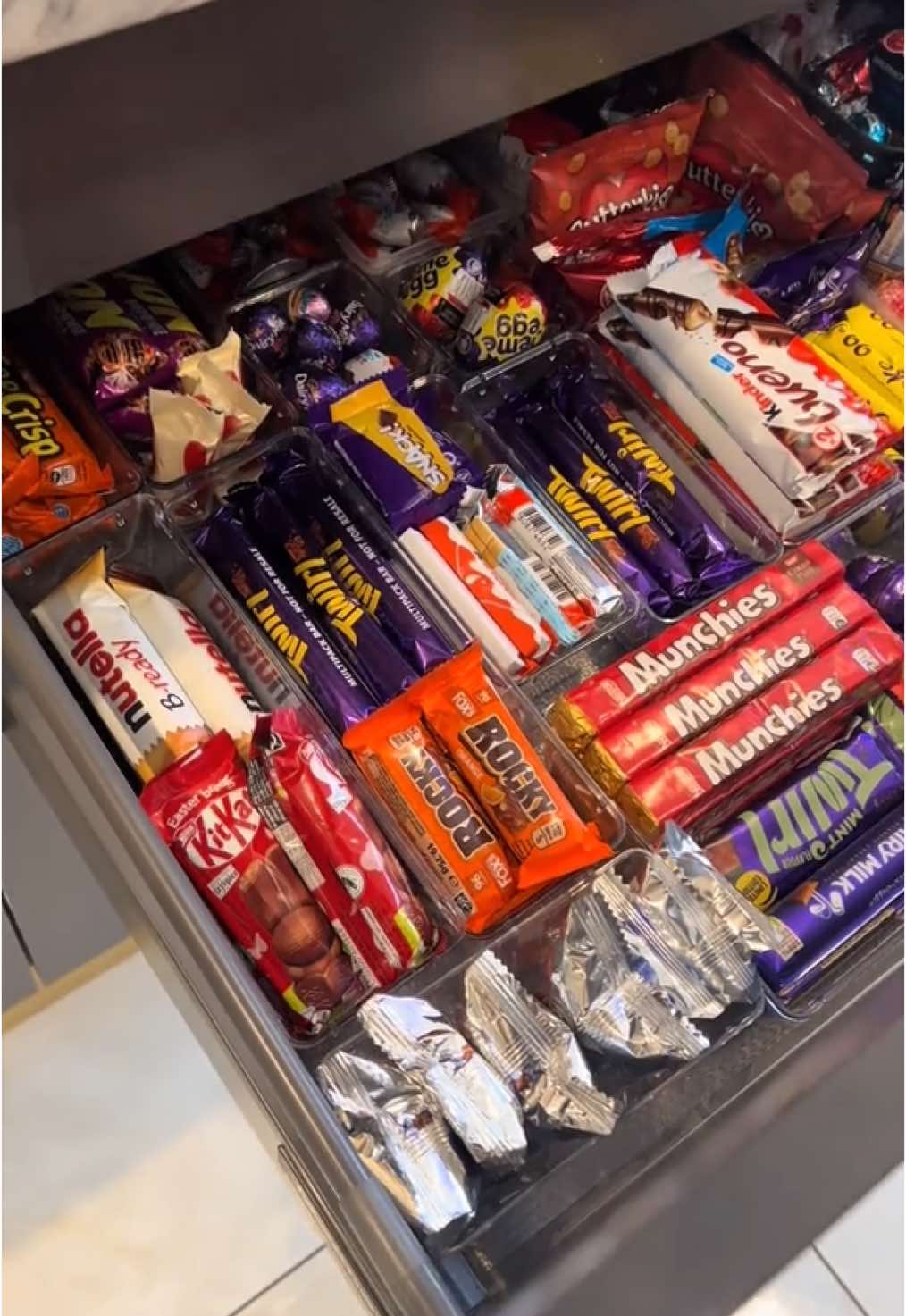 REPOST of our snack drawer. This went viral last year with over 1.6 million views  🙈  … . Allahumdiallah Always 🫶🏻❤️ . #fyp ##fypgnetkitchen #f#fypviral #kitchen#kitchen #s#snacksa#allahumdulillahblessed#capcut #throwback #foryoupage❤️❤️ #chocolate #crisps#foryou@Magnet Kitchens 