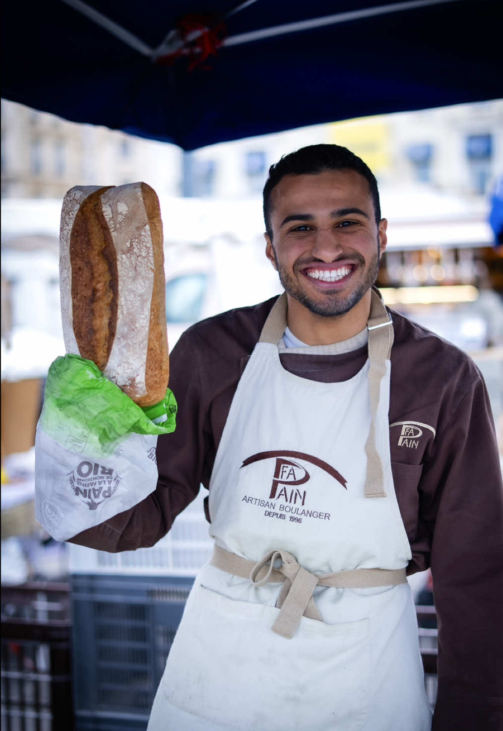 15/300 - Bread feeds the body, Omrane feeds the soul too ✨ A portrait, a gift, and a moment of pure connection.🙏 Marseille, you are special. 💙 #streetphotography #travel #sonyalpha #foryou #pourtoi #france #marseille #vieuxport #baker #boulanger 