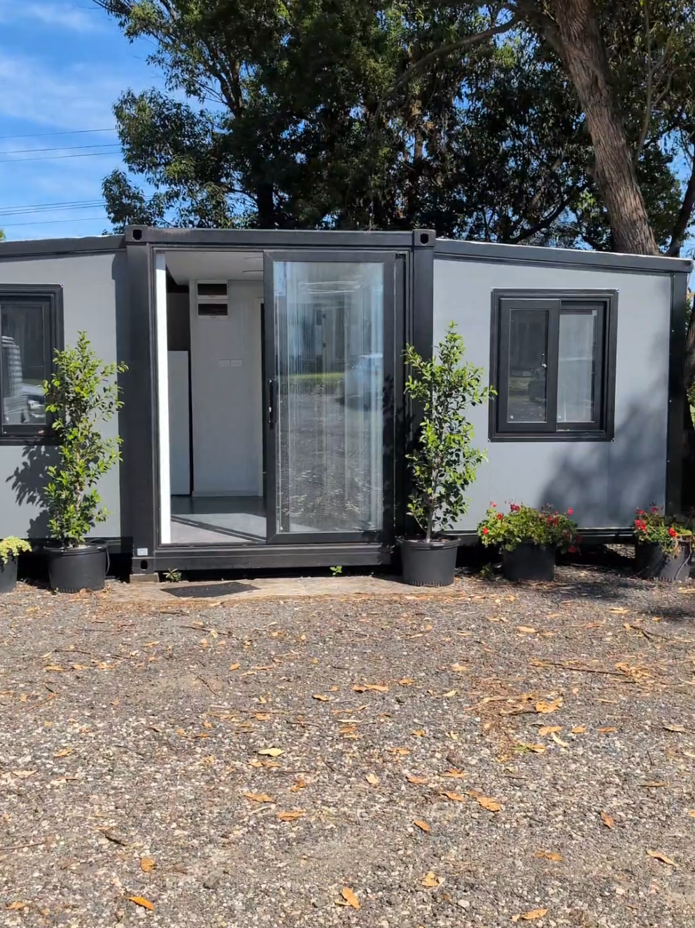 Say 'Welcome Home' to the VIOLET20 expandable container home 🏡  This unit comes in black and white and is the perfect addition to your backyard!  #modularhomes #foryou #fyp #foryoupage #trending #expandablehouse #containerhome #tinyhouse #tinyhome #VIOLET 