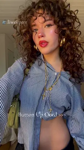 Striped Shirt Chic 💙🤍 A blue & white striped shirt = timeless & effortless! This look is casual, preppy, & cute! ✨ 🎥: @lilliegracep #PreppyAesthetic #StripedShirtLook #CasualChic #OOTD #FashionInspo #WardrobeEssentials #EffortlessStyle #TrendyLooks #TikTokFashion #FYP