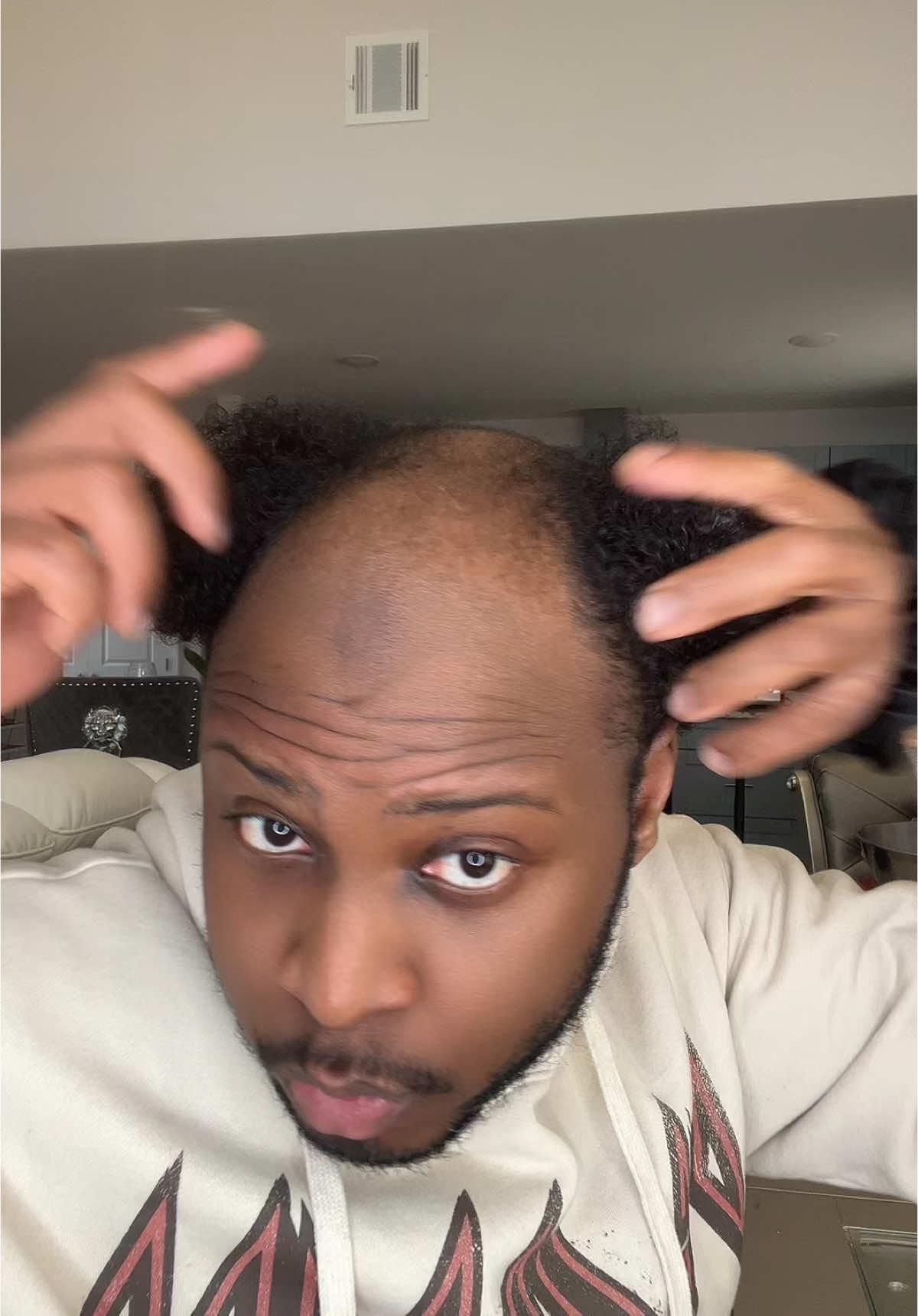 Bald man putting his hair in a bun #hair #bald #fyp 