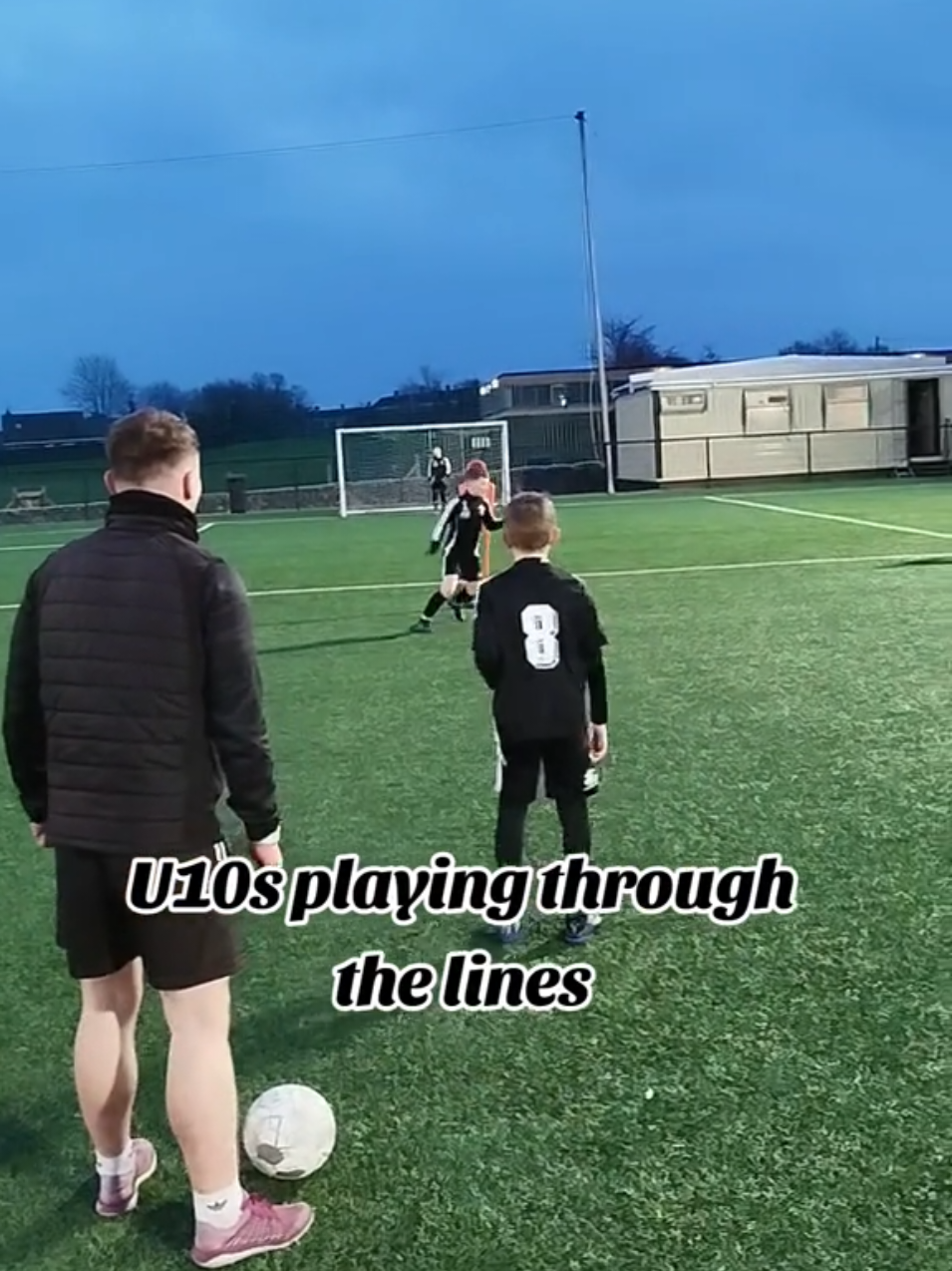 U10s working on playing from midfield to the forward line, back to the wide man who slides the other forward in for a cross to the box.  #football #footballcoaching #transitionplay #footballtips #footballdrills 