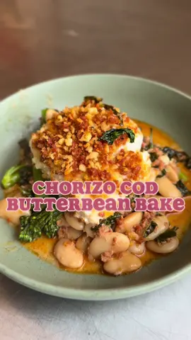 🐟 Chorizo Cod Butterbean Bake  Ingredients: * Chorizo - 225g * Red onion - 1 * Garlic cloves  - 3 * Butter bean + juice - 2 tins * Parmesan - 30g * Cavolo nero - 100g * Tender stem - 100g * Cod - 550g * Creme fraiche - 1 tbsp * Panko bread crumbs - 50g 1. Preheat the oven to 200°C. 2. Finely dice one red onion and 3 garlic cloves.  3. Chop chorizo into chunks and add it to a food processor. Blend to a crumb 4. Set aside about a quarter of the chorizo. 5. Add the rest of the chorizo along with the red onion and garlic to an oven tray with 2 tbsp olive oil. Mix and place in the oven for 10 minutes. 6. Strip the cavolo nero and slice the leaves into thin strips 7. Add the butter beans and their liquid along with the sliced cavolo nero to the pan. Mix and pop back in the oven for another 10 minutes.  8. Add 30g grated parmesan and 1 tbsp creme fraiche. Mix well and place ii the oven for another 10 minutes 9. Combine the remaining chorizo with 50g panko breadcrumbs. Season the cod and top with the chorizo crumb. Cut the tenderstem into thirds. 10. Place the cod loins in the pan and lay the tenderstem around.  11. Bake for 10-15 minutes until the cod and tenderstem are cooked. #easy #onetray #onepan #fish #cod #chorizo #nduja #beans #butterbeans #Foodie #delicious #healthy #protein #brinsdins #dinner #tasty #cooking #baking #roast