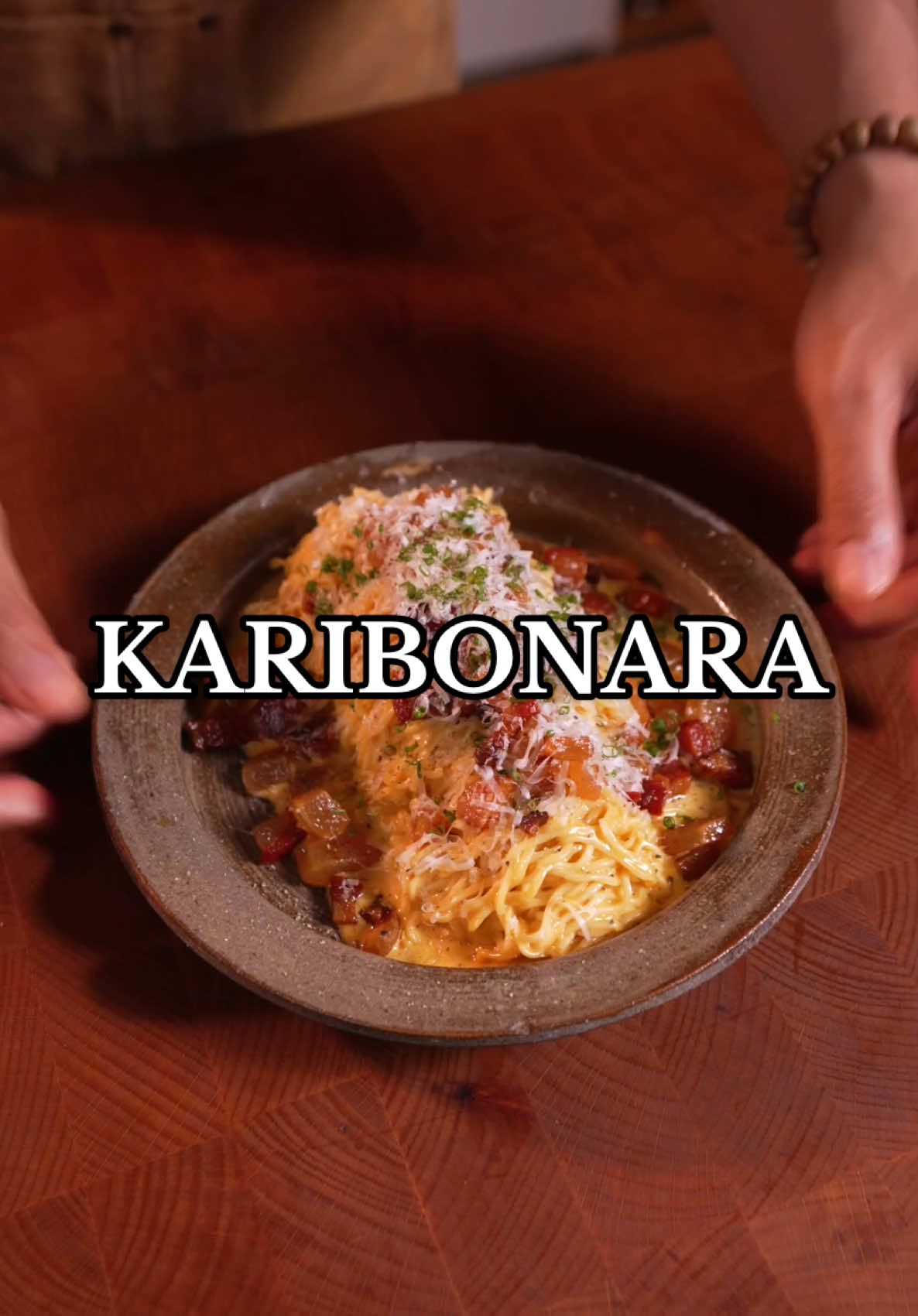 KARIbonara 🍝 If you are a person who enjoys their spice, or just bold, unique and tasty flavors I’d highly suggest trying out these Maggi Kari Noodles! Finally tried it for the first time and I can say it didn’t disappoint. I’ll be stocking up on this, indefinitely.  But of course we gotta make our own twist on this, by combining elements of traditional carbonara with Kari and it worked!! Luckily, they currently have an online exclusive promo ‘save php 20 budol deals’ so you can try these noodles or even this combo at a decent discount!  Ingredients: - 1-3 egg yolks - ⁠thick cut bacon or guanciale (depending on availability), sliced into cubes - ⁠1/2 cup parmesan cheese ⁠- pepper to taste - 3-4 packs of Maggi Kari Noodles  Instructions:  - First start by boiling your Kari Noodles, and setting aside your flavor packets for later - In a hot pan, fry up some guanciale or whatever bacon you can find, and fish out the bacon bits, and save the oil for later. - In a separate bowl, mix together parmesan cheese, egg yolks, maggi kari flavor packets, pepper and some of the guanciale or bacon oil and whisk together.  - Place the cooked noodles inside and top it off with the guanciale, and mix until combined evenly. Top with more parmesan cheese, and serve and enjoy! #GetKaridAway #MaggiKariPH #ASMR #ASMRCooking #KaribonaraChallenge