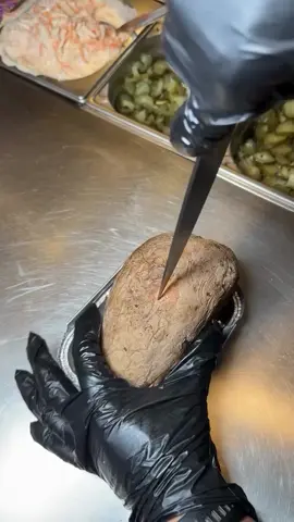 Kumpir 📍Turkey 🇹🇷 Learn more: https://www.tasteatlas.com/kumpir A staple of Turkish street food, Kumpir is a baked potato with a crispy skin and a soft, buttery interior. Once mashed with butter and cheese, it becomes a rich and creamy base for an array of toppings. Popular choices include pickles, olives, corn, sausages, mushrooms, and various sauces. Especially famous in Istanbul’s Ortaköy district, Kumpir offers endless customization, making it a favorite for street food lovers across Turkey. Video: @neyesekyaaa & @kucuk_esnaf01