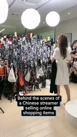 Now this is influencing.  Footage shows just how many phones a Chinese streamer films on to post fashion videos across different platforms. China has a massive market for live-streaming and e-commerce, that's left Amazon and Google scrambling to compete with this kind of selling strategy. #fyp#chinatiktok#influencers#influencerinthewild#asia#viralvideos