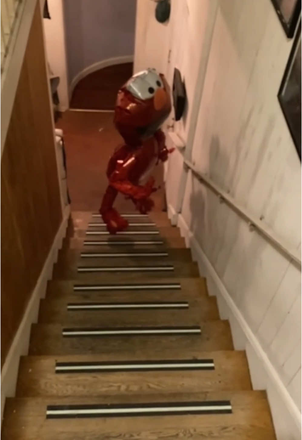 #duet with @happyrayness #balloon  Time to move! The balloon elmo is walking up the stairs by itself! 