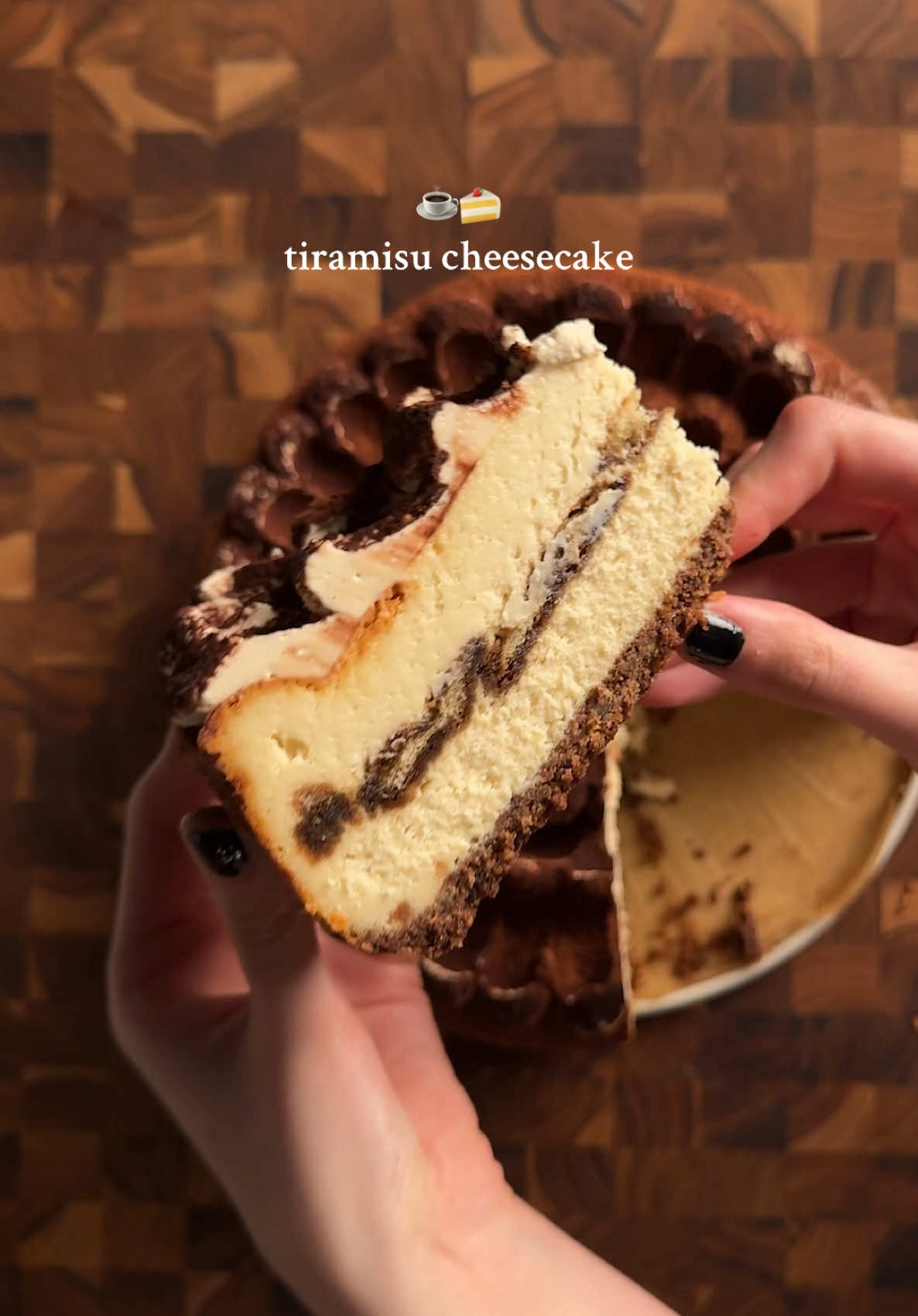 Tiramisu Cheesecake ☕️🍰 Crust: 18-20 (300g) graham crushed graham crackers 1 tsp (2g) espresso 1 tbsp (14g) cocoa powder 5 tbsp (75g) butter *mix and press into cake pan. Bake at 350 for 7-8 min before adding cheesecake filling. Cheesecake Filling: 24 oz cream cheese 8oz mascarpone  1 1/2 (300g) cups sugar 1/2 tsp (3g) salt 1 1/2 tsp (4g) vanilla  1 tsp (2g) espresso powder (in water) 4 eggs 1/2 cup (120g) heavy cream 3/4 cup (170g) Greek yogurt 1 tbsp (8g) corn starch Use ingredients at room temperature. Cream together cream cheese and mascarpone. Add in sugar, salt, vanilla, espresso and mix well. Add in 4 eggs and mix. Add cream, yogurt and corn starch, mix well.  Add half the mixture to the crust (that’s been baked) and then layer the espresso-soaked lady fingers. I use 12 and make sure to dip quickly, don’t let them soak in the espresso too long. Layer the other half of the cream cheese mixture and then bake at 320 for about 80-90 minutes. This will vary depending on how big of a cake pan you used. NOTE: springform pan is best.  Once it slightly jiggles in the middle it is done. Take out and let cool to room temperature then pop it in the fridge until fully chilled (I put mine in overnight).  Coffee Mascarpone Cream 4oz mascarpone 2 tbsp (12g) sugar 1 tsp (2g) instant espresso in water  1 cup (250g) heavy cream Combine mascarpone with sugar and coffee. Mix well. Add in heavy cream and whip until it thickens to desired texture. Add on top of chilled cheesecake and then dust in cocoa powder! #tiramisu #cheesecake #baketok #baking #Recipe 