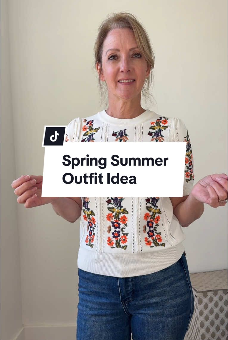 Pretty Spring or Summer outfit idea. Over 50 fashion with a spring or summer top and Judy Blue high rise jeans. Floral embroidered sweater for the win! #over50fashion #50andfabulous #springfashion #fashiontiktok #floraltop #tops #jeans 