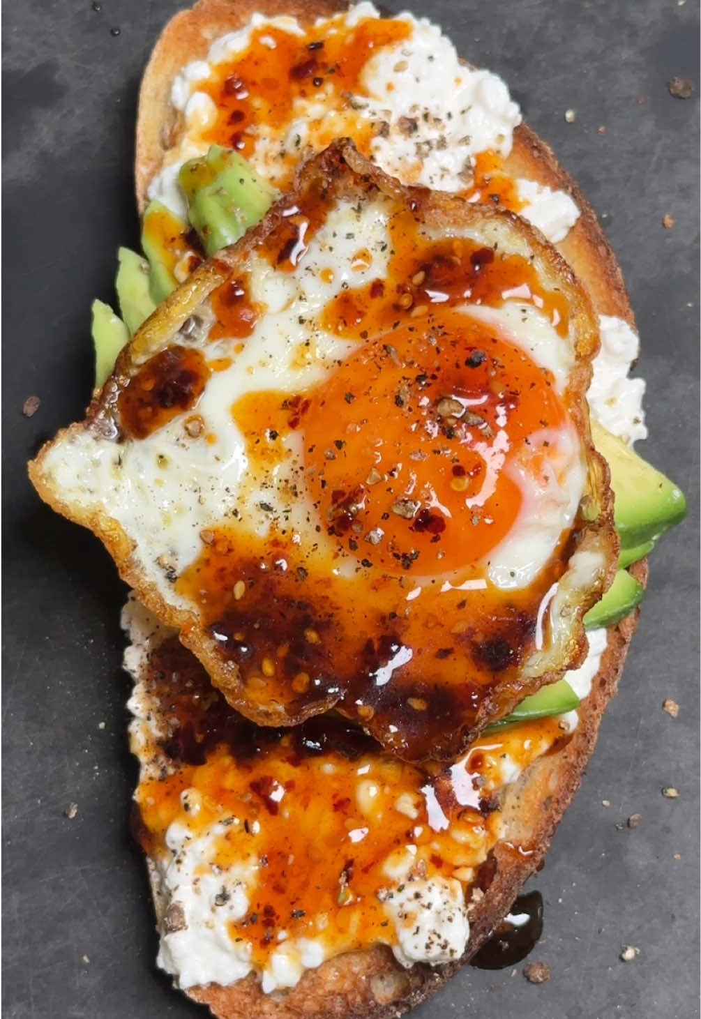 Happy National Toast Day Celebrating one of my favorite days of the year with a mashup of your all-time favorite toasts! Which one is your favorite? Let me know in the comments below👇 1. Spicy Protein Toast 2. Almond Butter Banana Toast 3. Tomato Confit Pesto Toast 4. Caviar Toast 5. Spicy Avocado Toast Comment ‘recipe’ plus which ones you’d like and I’ll send the recipes to you!  Hope you enjoy! #nationaltoastday #avocadotoast #pesto #chilicrisp #cottagecheese #sourdough 