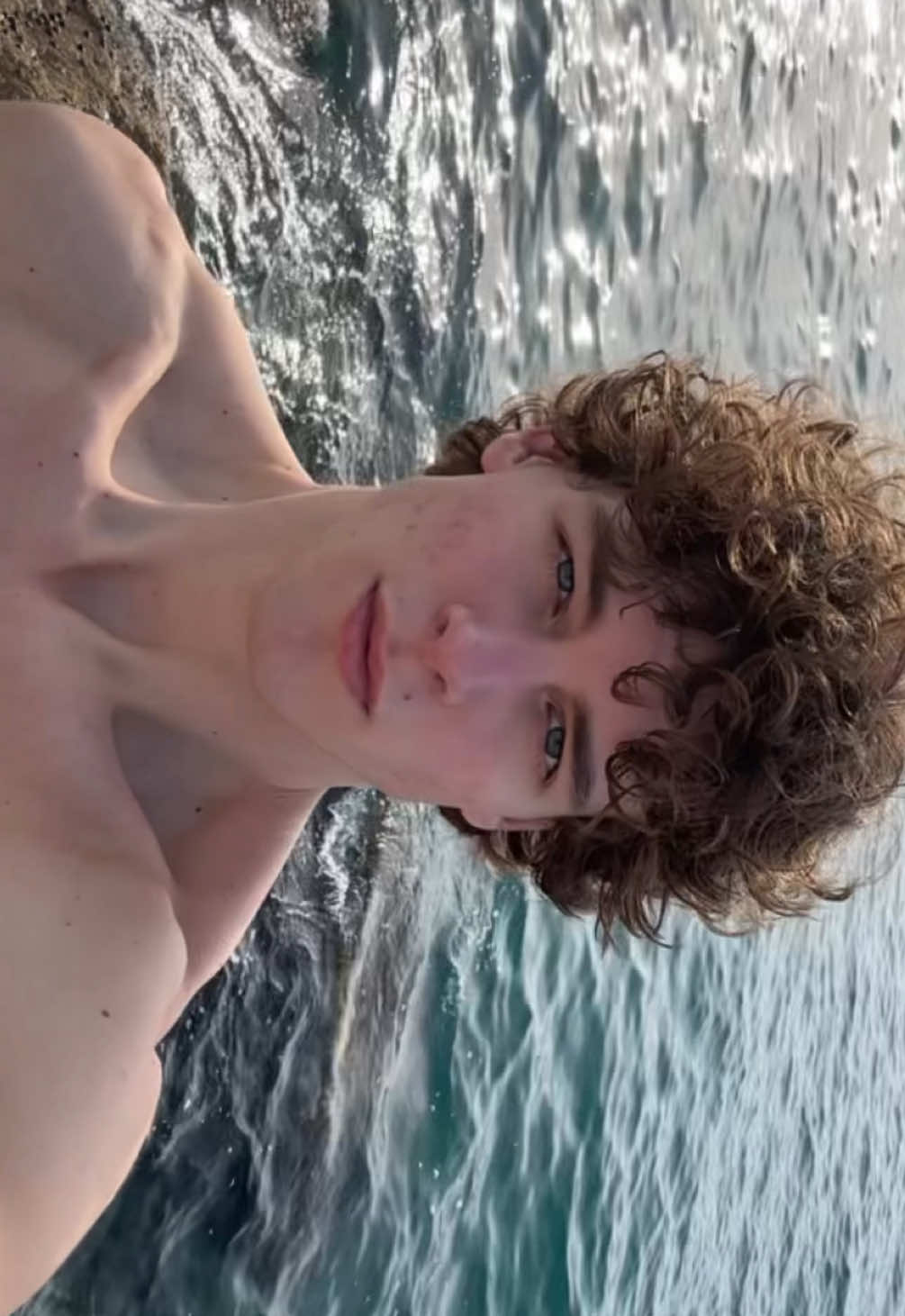 Loving malaga<3 #malaga #spain #vacation #sea #beach #boulders #curlyhair #modcut #greekcurls #malemodel #model #models #modelling #malemodelling #malemodels #fyp #mog #mogger #psl #beachwater