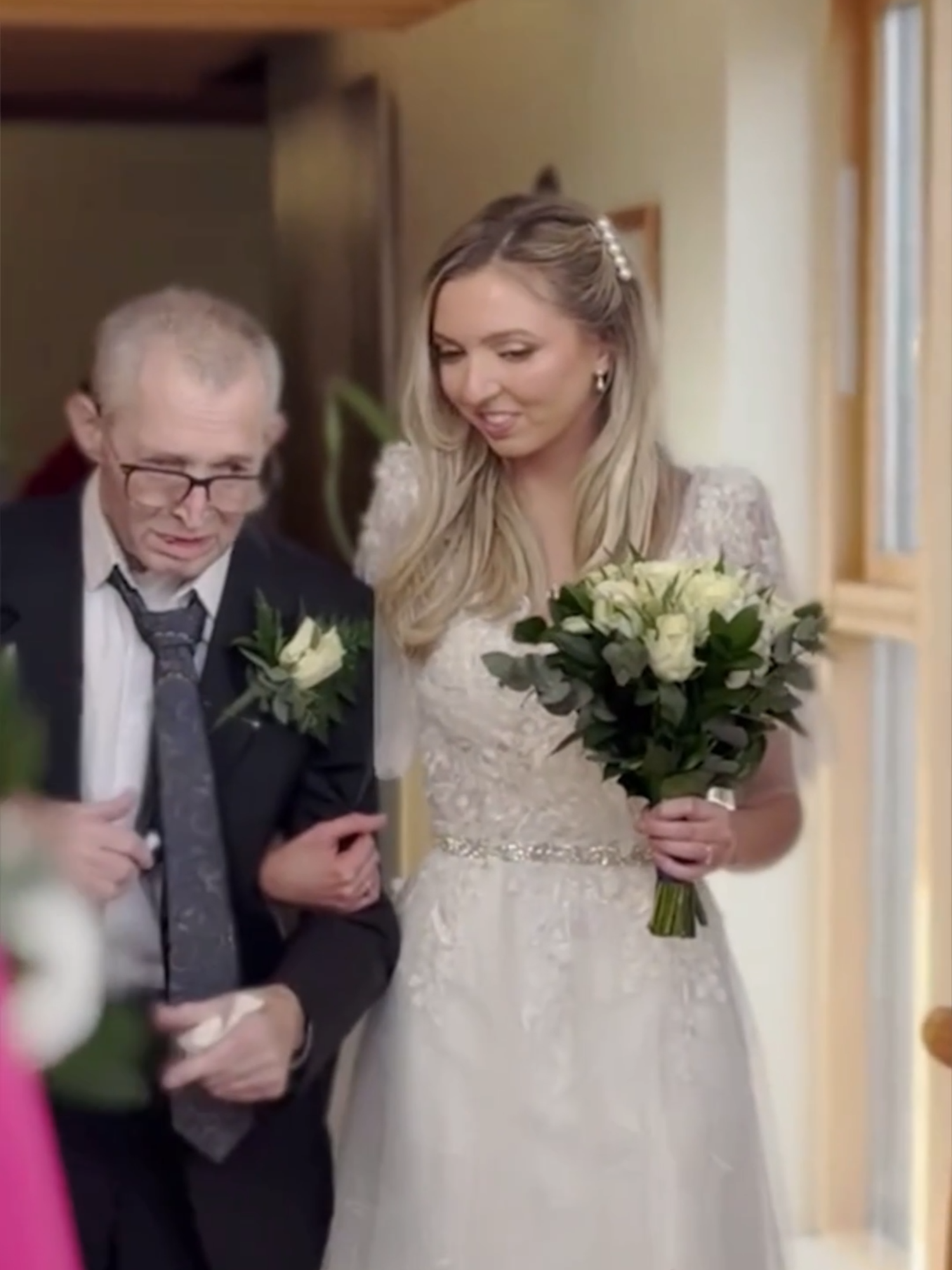 Hannah Haynes, 29, rushed into action because she didn't want Maurice Haynes, who is currently receiving care at St Giles Hospice in Whittington, to miss out. Maurice, 69, was diagnosed with terminal tonsil cancer in October 2024. With the assistance of hospice staff, Hannah and her partner Josh, also 29, were able to organise their special day in under 24 hours. On February 18, Maurice, from Cannock, walked his daughter down the aisle in an emotional moment captured on video. #news #westmidlands #birmingham