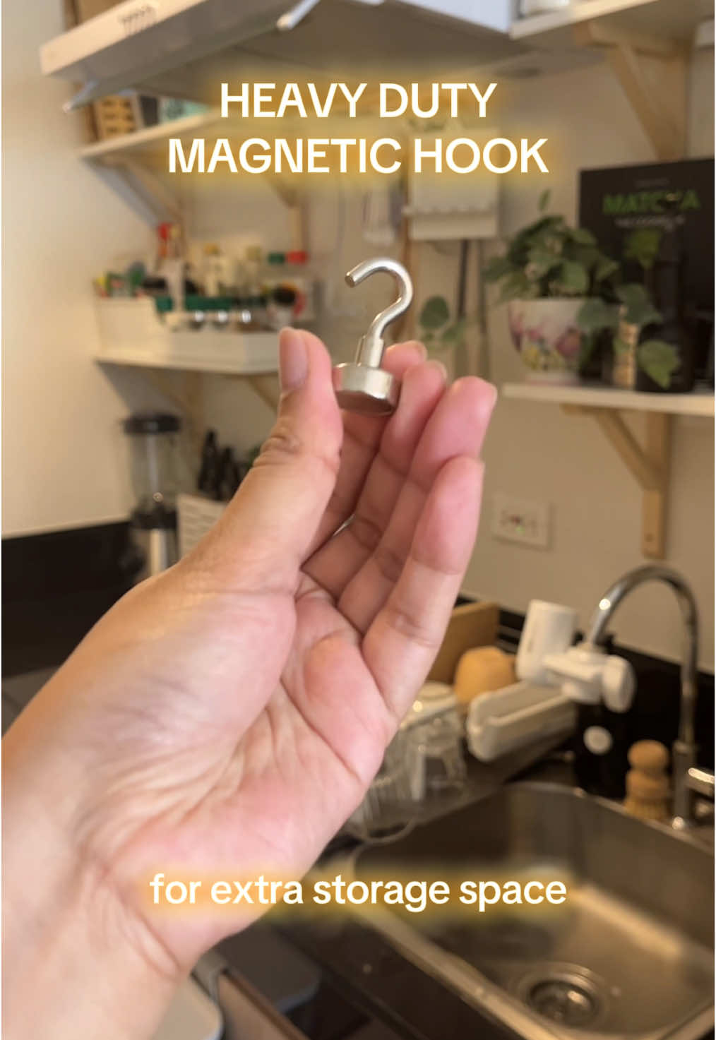 this small but strong magnetic hook can give you extra storage space! ✨ #storagesolution #kitchenhack #storagetips #storagehacks #kitchenessentials 