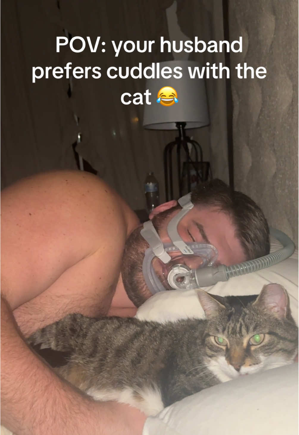 She is prob a better snuggler lol #husbandwife #husband #husbandwifecomedy #husbandandwifecomedy #funnycouple #cuddles #catslovers #catsoftiktok #snugs #cpap 