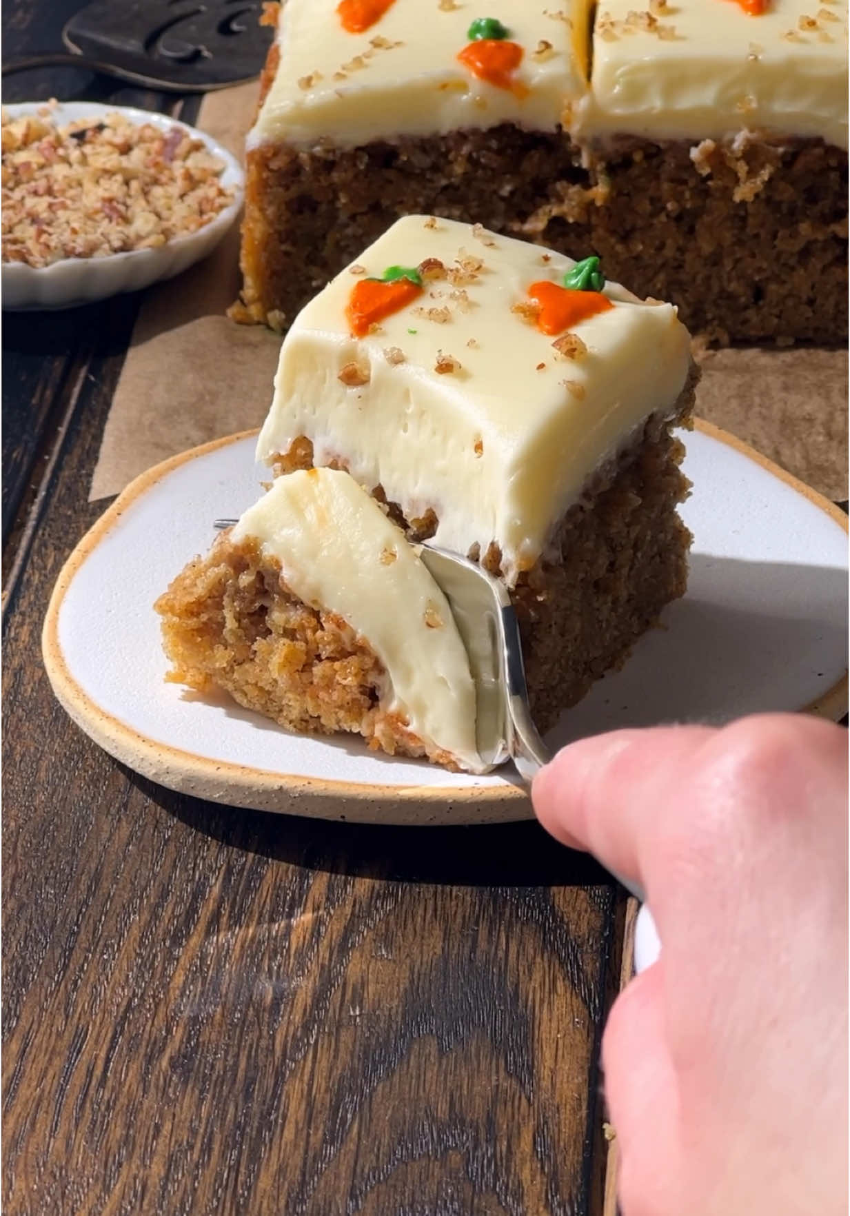 Best Carrot Cake 🥕🧡 Finely grated carrots melt into the batter while baking making the cake extra moist and tender. It’s flavored with lots of warm spices, frosted with the best cream cheese frosting and decorated with mini carrots for the cutest spring touch! 🧡 #carrotcake #creamcheesefrosting 