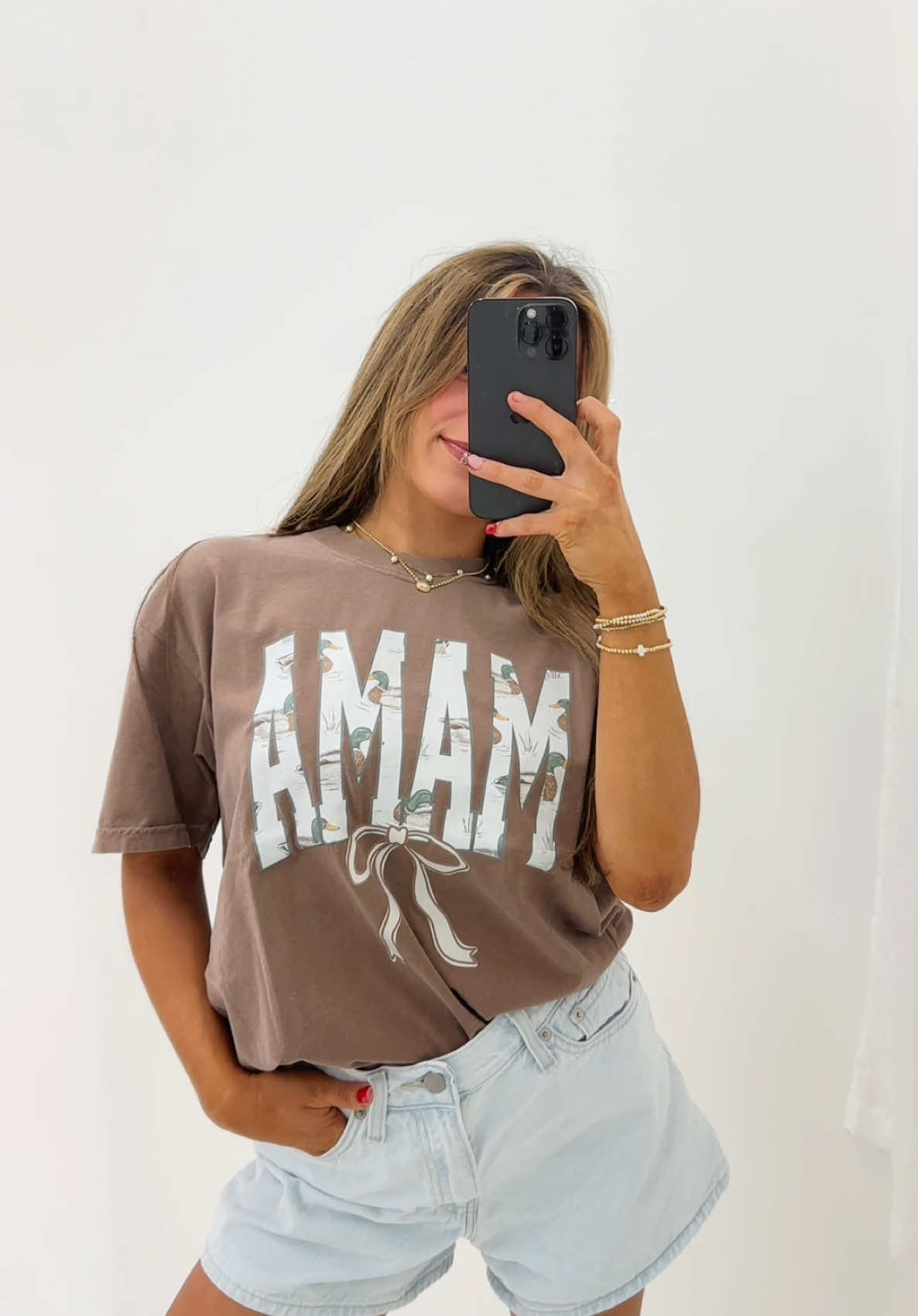 all the tees are $29 and the crewneck is $34 !! runs TTS also im a size 4 wearing a medium for reference 🤎 #graphictees #comfortcolors #dressedbyalliah 