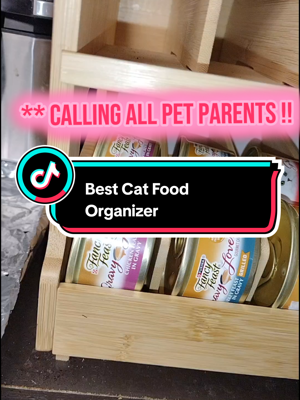 it makes life so much easier. just drop the cans in on top and they slide into place. enough room for tons of cans and treats (or whatever) on top! a great storage for pet food! don't miss out. grab yours today!! click the shopping cart. #musthave #spotlightfinds #tiktokshop #catfood #organization #petfood 