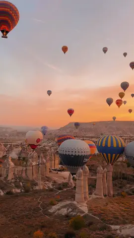 Send this experience to a friend you want to share it with. soaring through the sky at sunrise 🎈 #cappadocia #hotairballoon #travelturkey #dateoftour #travelbucketlist #fairychimneys 