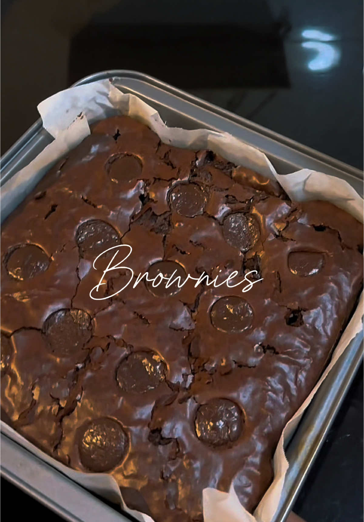 Sometimes all you need is a little flour, sugar and chocolate 🍫 ♥️  Ingredients  Dark chocolate - 200g Butter - 125g  Egg - 2  Brown sugar - 1 cup  Vanilla essence - 1 tsp  Flour - 1 cup Cocoa powder - 2 tbsp Baking powder - 1 tsp  Salt - 1 tsp   1. Double boil dark chocolate and butter until fully melted  2. Whisk eggs and sugar until the sugar dissolves  For shiny crack top, whisk a litter longer  3. Pour the chocolate mix over egg mixture  4. Add the dry ingredients, fold gently  Don’t  over mix once you add dry and wet ingredients  4. Preheat and bake at 160 deg for 30-35 minutes  5. ⁠Let the brownies cool completely before cutting Enjoy Baking !! 🥰 #brownies#fudgy#WeekendVibes#happywomensday#fypage 