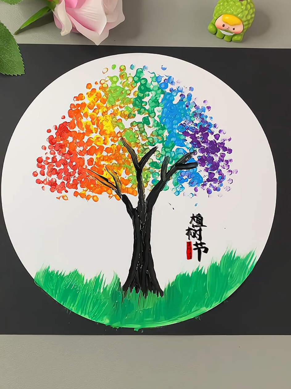 Create a Stunning Rainbow Tree with Cotton Swabs!  #creativeart #diycrafts #paintingforkids #easyart #rainbowtree #funpainting #kidscrafts #artforkids #simplecrafts #toddlerart #homedecorideas #handmade #arttherapy