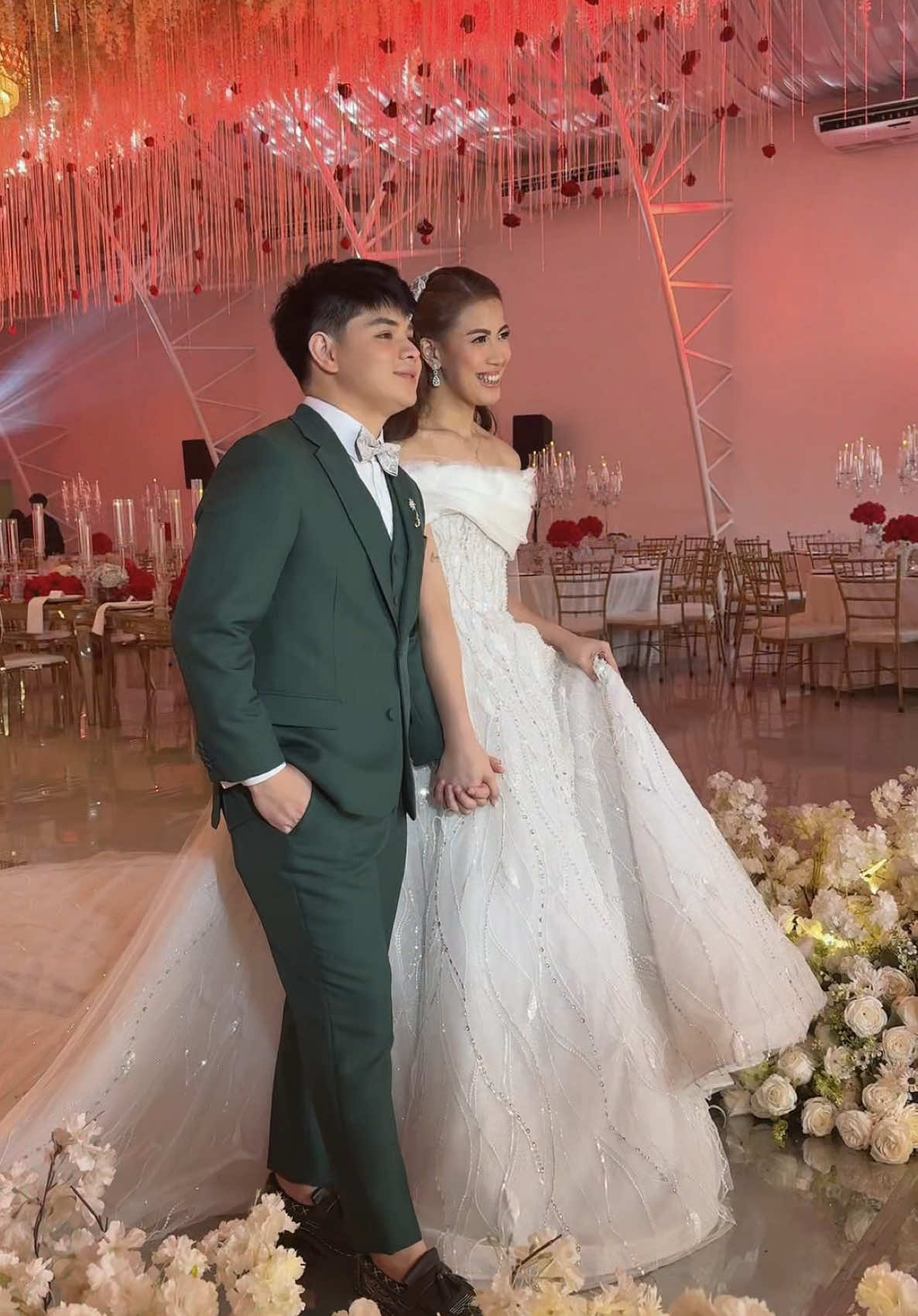 Our newlywed couple, actor Bugoy Cariño and volleyball athlete EJ Laure, along with their daughter, Goin’ Bulilit star Scarlet, shared their beautiful moments on their wedding day! 💍✨ Your love story is truly inspiring, and we wish you a lifetime of love and happiness. Thank you for trusting Mark Brides Manila to be part of your special day! ❤ Coordinator: Events by Miss P 👰‍♀️: Team Ennajie Laure 🤵‍♂️: BUGOY Cariño Gaming @Bugoy Cariño  💄: @edwardthestar 📸: Nice Print Photography & Exige Weddings Event Stylist: Tei Endencia No copyright infringement intended, this music belongs to the rightful owner #bridesof2025 #brides  #bridesoftiktok #ReMarkablySophisticated #weddingdresses #bridestory #weddingtiktok #MarksBridesManila #trend #trendinggown #trendgowns #koreanwedding #koreandress #koreanlook #bridaldress #bridalgown #weddingdesigns #weddinginmanila #weddinginphilippines #weddingphotography #markbrides #weddingdesigner  #bride #weddingdress #bridal #bridetobe  #custommade #nocopyrightinfringementintendedmusicbelongstotherightfulowner #onceennalifetimewithbugoy 