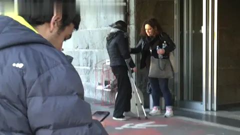 Beautiful girl crutches - grey sock on slc - Trim