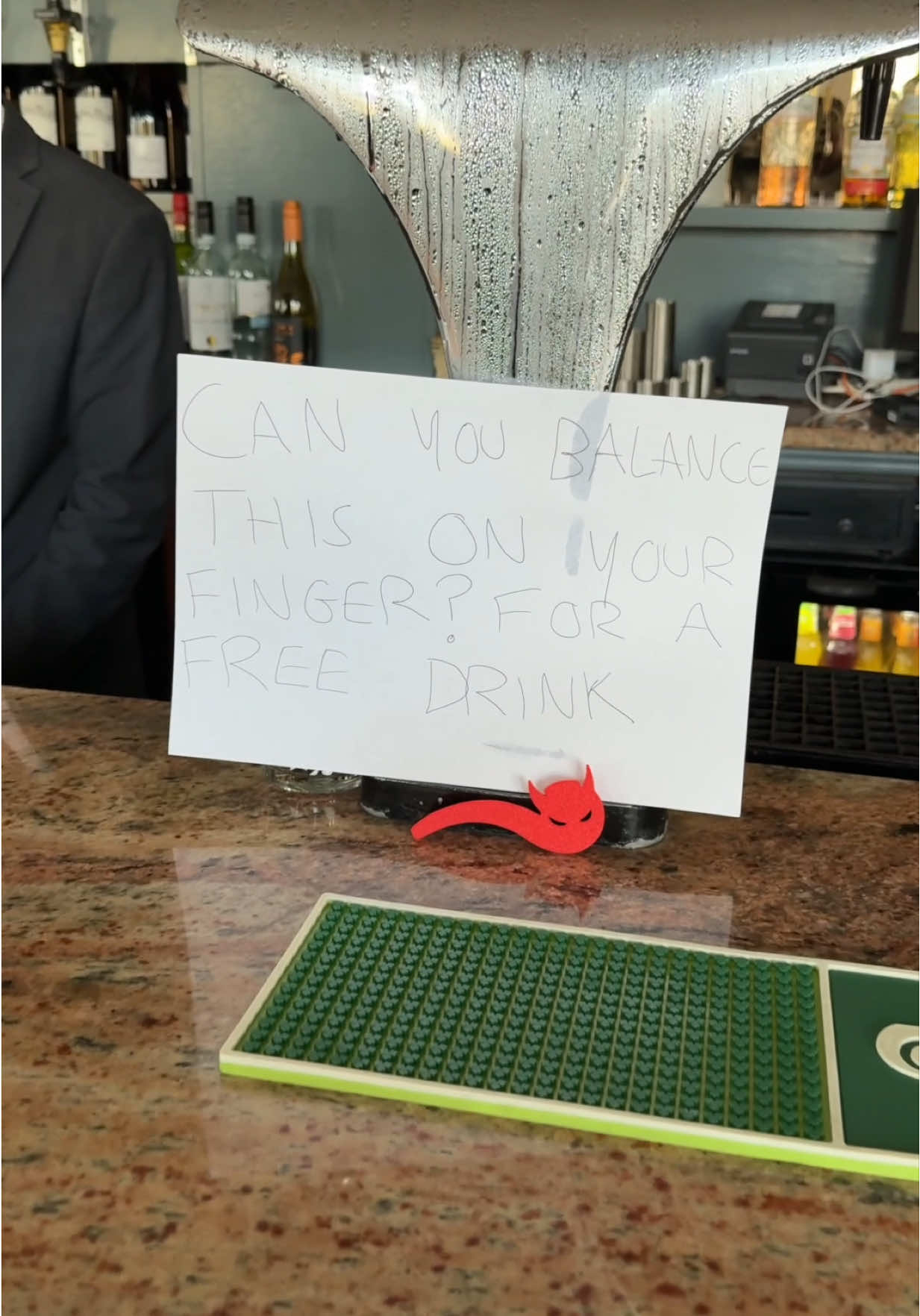 Balance the Devil to win a free drink 