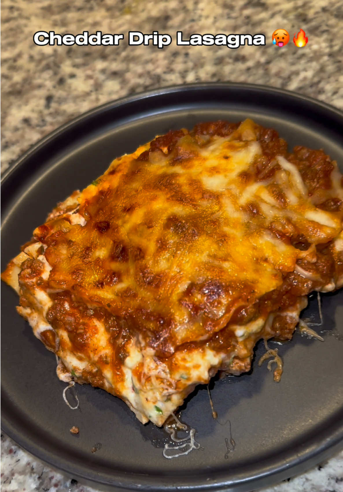 Cheddar Drip Lasagna fresh out the oven! Who’s hungry? 🍽️🧀  1️⃣ Preheat oven to 375°F. Cook lasagna noodles & set aside. 2️⃣ Brown ground beef, drain excess grease. Add tomato paste, pasta sauce & water. Season with Italian seasoning, onion powder, garlic powder & red pepper flakes. Simmer for 10 min. 3️⃣ In a bowl, mix ricotta, egg, cheeses , & seasonings . 4️⃣ Layer:  noodles ➝ ricotta mix ➝ meat sauce ➝ cheddar & mozzarella. Repeat & finish with extra cheese on top! 5️⃣ Bake covered for 30 min, then uncovered for 10 min at 375°F. 6️⃣ Let sit for 10 min, then slice & enjoy that  #lasagnarecipe #lasagna #cookinwkiaya #cookinwkya #cheddardriplasagna 