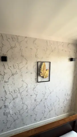 Marble textured wallpaper done Perfect results Marble shinning white silver wall 1 meter by 10 meters covering 10 square meters @2000 The wall took only 2 rolls 0796630708
