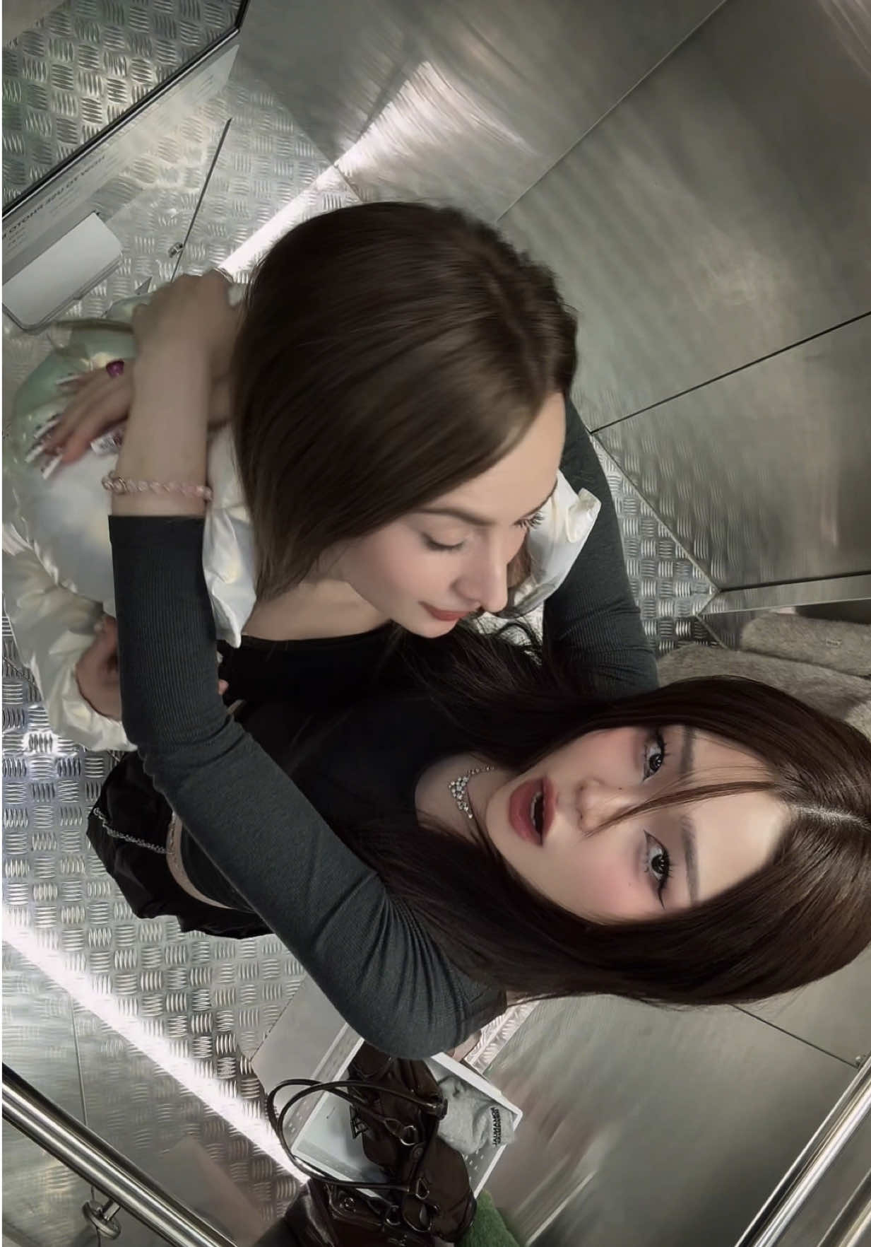 2 girls in an elevator 👧👧 #fyp #trend #explore  