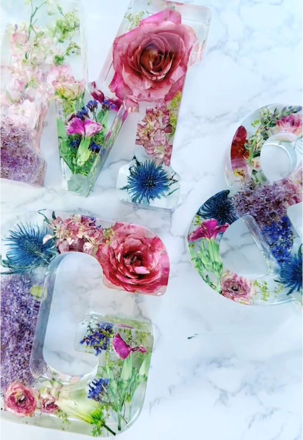 Stunning 16cm wedding initials made with brides bouquet #creatorsearchinsights #epoxyresin #handmadewithlove #resinprojects #fyp #floralpreservation #preservedflowers #floral #preservedweddingbouquet #weddingbouquet #handmadegifts 
