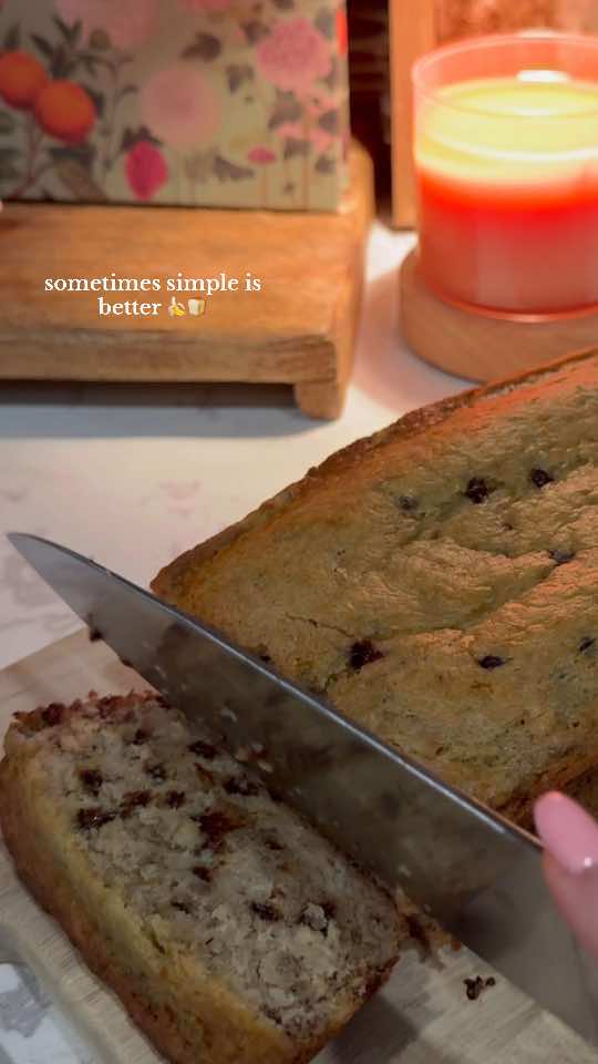 The best simple banana bread🍌🍞 Recipe: 3 ripe bananas  2 eggs  1/2 cup melted butter 1/2 cup sugar  1/2 cup brown sugar  1/2 cup milk  1 tsp vanilla  1 tsp baking powder  1 tsp baking soda 1 1/2 cup flour Chocolate chips  Pour into greased pan Bake at 355 for 45-50 minutes #bananabread #EasyRecipes #baking #easybaking #easybananabreadrecipe 