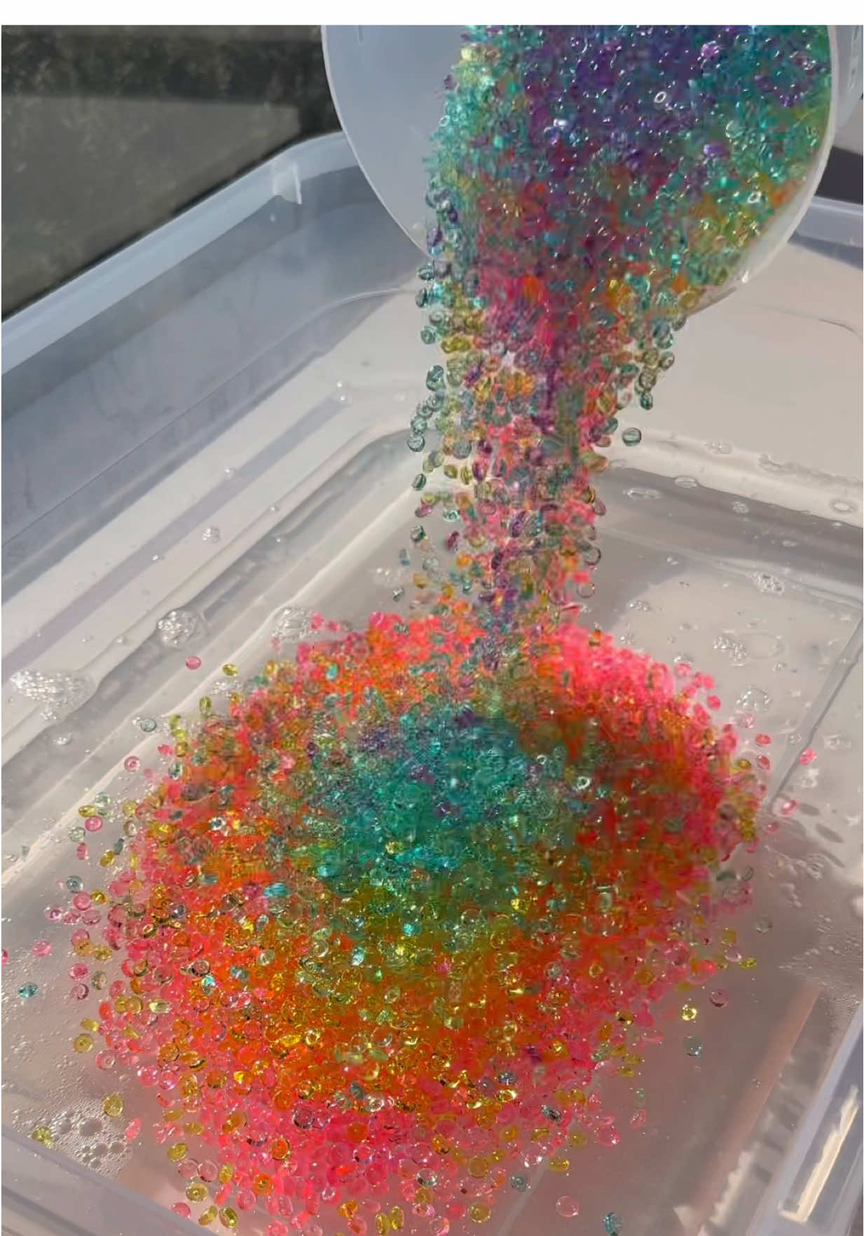 kaleidoscope 🌈✨ crunchy fishbowl slime with sugar scrub mixed in too! i forgot how much i love this texture 😍 new SPRING slimes coming this friday at 6 pm central 🌷 #satisfyingvideos #crunchyslime #asmr #slimemixing 
