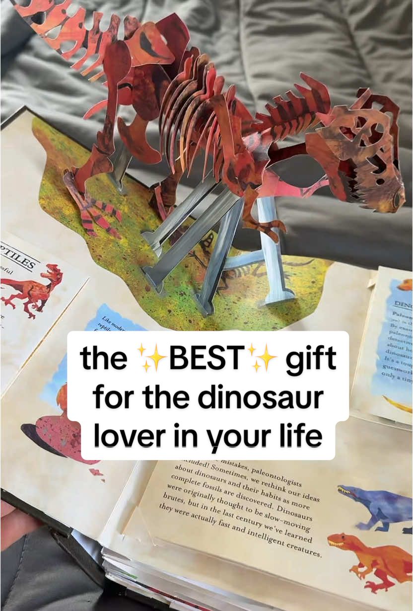 Replying to @Danii the perfect gift for a dinosaur lover!🦖🦕 #dinosaur #dinosaurs #dinosaurbook #giftguide #BookTok #encyclopedia #popupbook #kidsbooks  #tiktokshopcreatorpicks #tiktokshop 