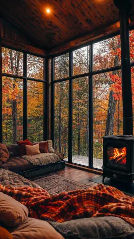 Rainy days and cozy nights. Nothing beats the warmth of a crackling fire and the breathtaking beauty of autumn outside your window. ✨ #AutumnVibes #CozyCabin #FallGetaway #Fireplace #Rainydays #ForestView #CabinLife #NatureLover #CozyHome #AutumnLeaves 