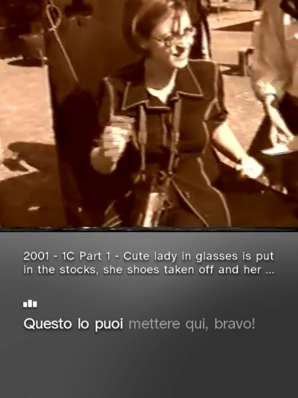 Cute lady in glasses is put in the stocks, she shoes taken off and her barefeet tickled