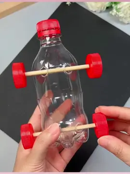 🥢☘Turn trash into toys! 🚗♻ Just plastic bottles, chopsticks & rubber bands = DIY toy car that actually runs! Genius or what? 😍 #UpcycleHack #DIYToy  #EcoFriendly #Upcycling #Handmade #HandCrafts #SustainableLiving #Lifestyle  #fun 