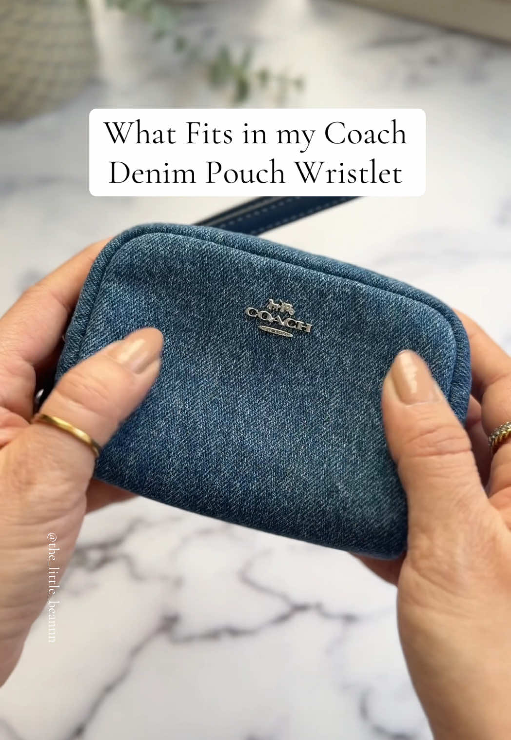 She packs a punch🤯 Not only is this adorable @coach denim Pouch Wristlet so cute, it fits a TON!👏👏 Coming in at $41, I’d say it’s totally worth it!💗 Link in my bio!💗 #whatsinmybag #bagoftheday #wimb #botd #organizewithme #asmrrelax #asmrreels #minibags 