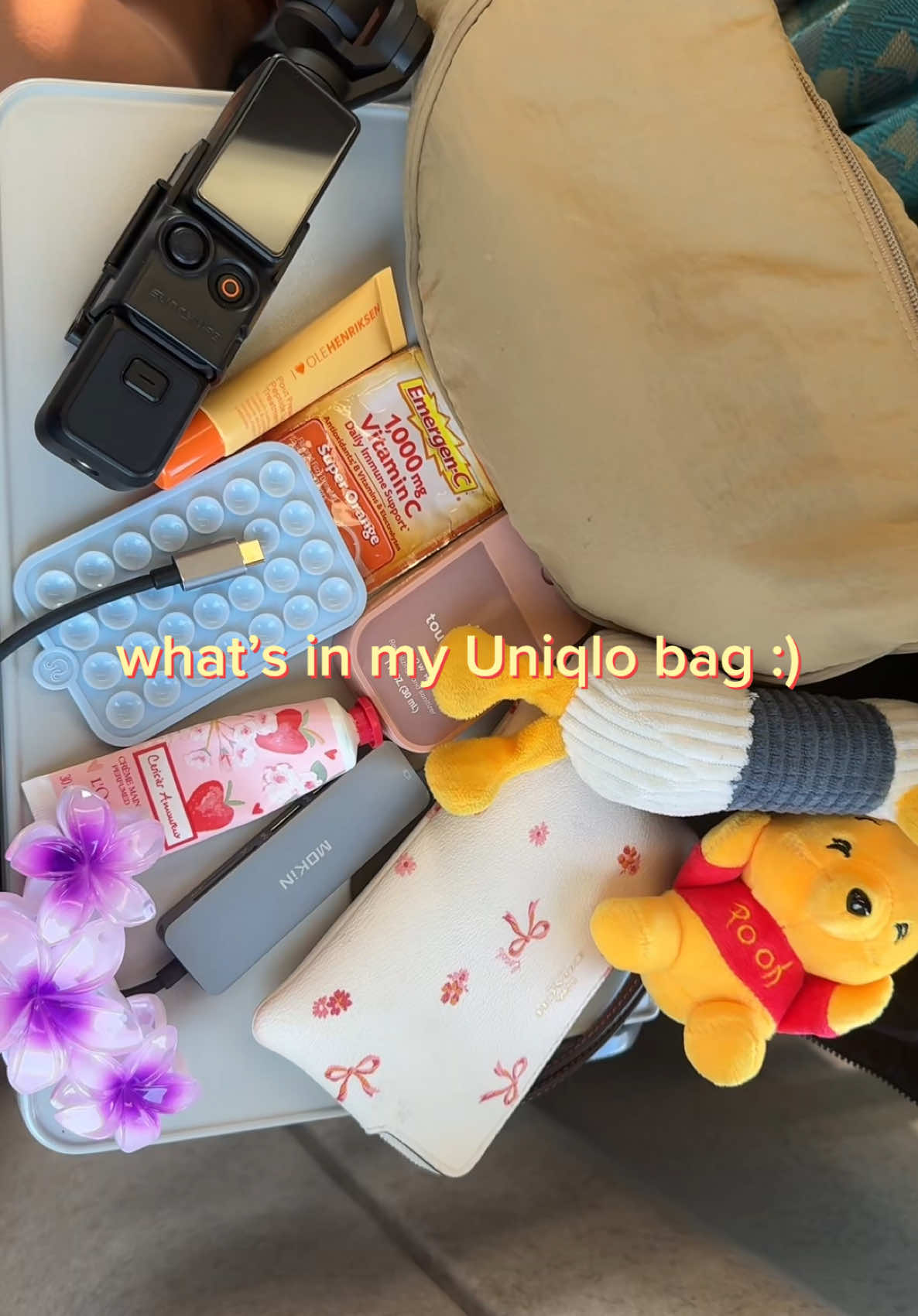 I caved and bought the @DJI Osmo pocket 3 🤭🥹~ #whatsinmybag  @LOCCITANE hand cream🧴 @touchland hand sanitizer 🫧 @Coach wallet🎀 @Olehenriksen lippy 💋 @OCTOBUDDY 🐙
